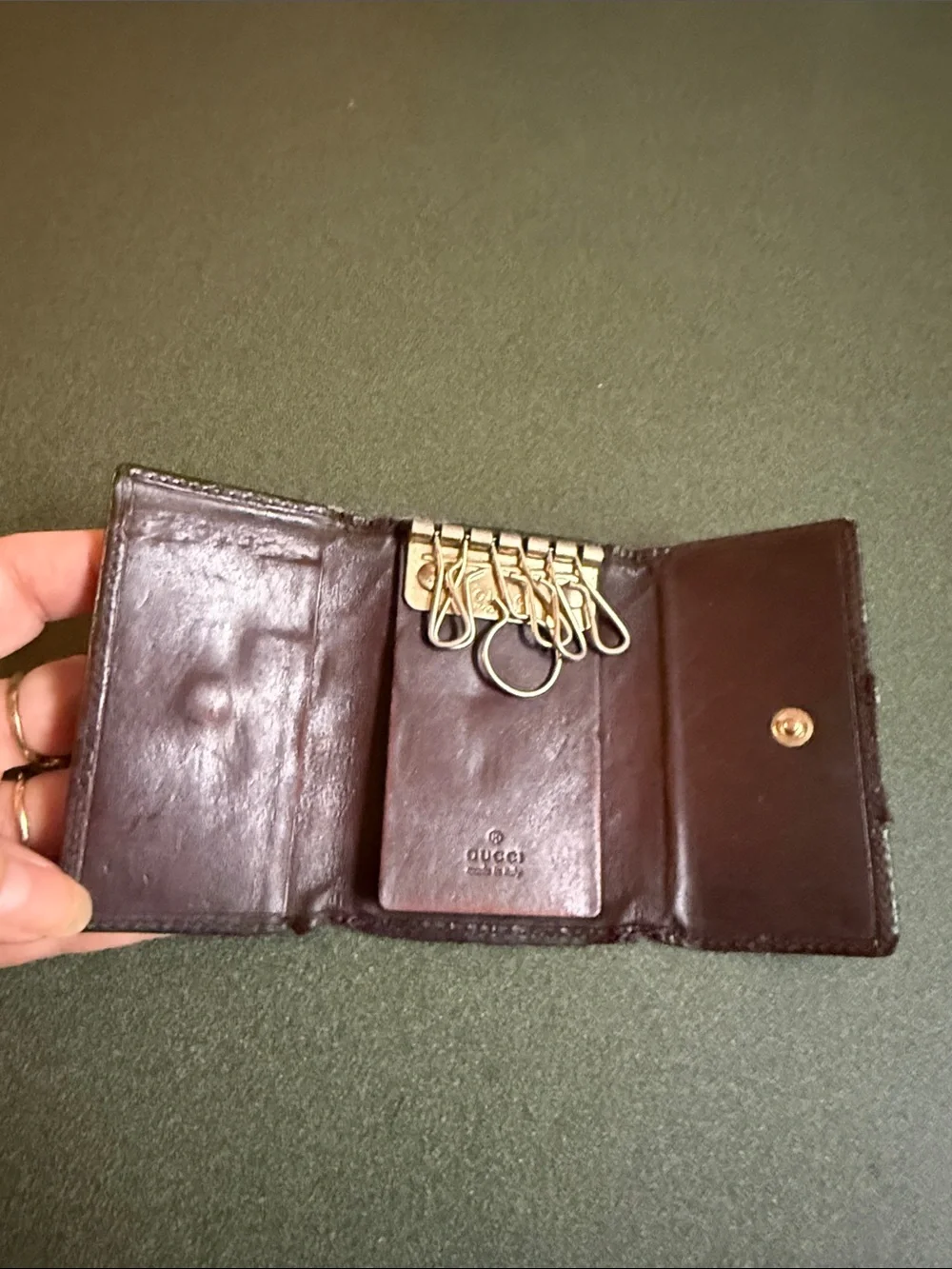 Gucci leather embossed